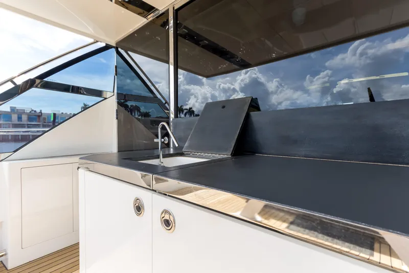 Slide: The Image of Outdoor kitchen on 2012 Cheoy Lee 76 Alpha yacht with sleek countertops and sink. - 14