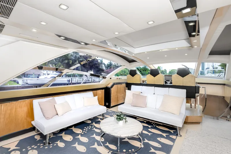 Slide: The Image of Luxurious interior of 2012 Cheoy Lee 76 Alpha yacht with modern seating and elegant decor. - 21