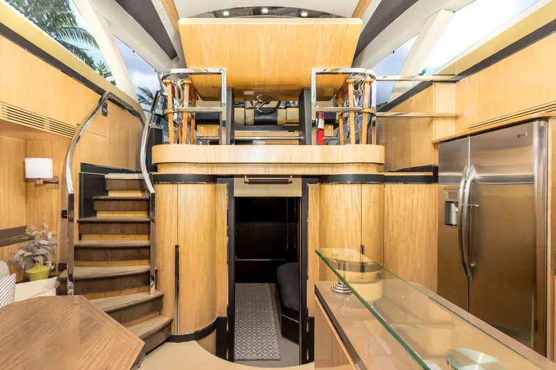 Slide: The Image of Interior of 2012 Cheoy Lee 76 Alpha yacht with modern wood finishes and stainless steel appliances. - 28