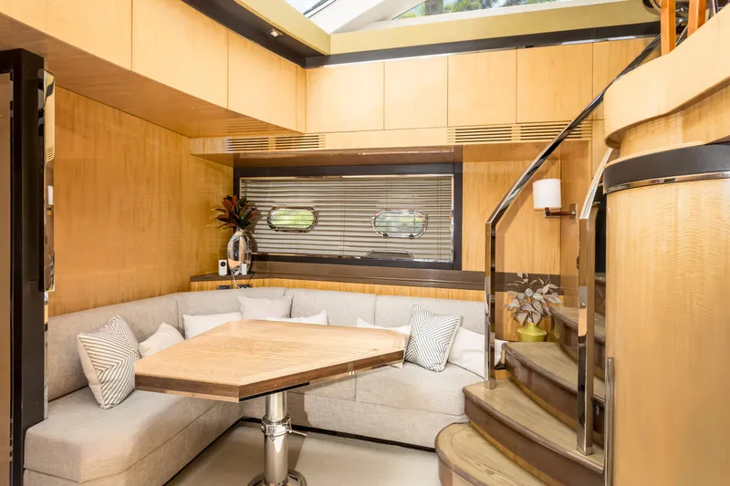 Slide: The Image of Luxurious interior of 2012 Cheoy Lee 76 Alpha yacht with elegant seating and wooden accents. - 32
