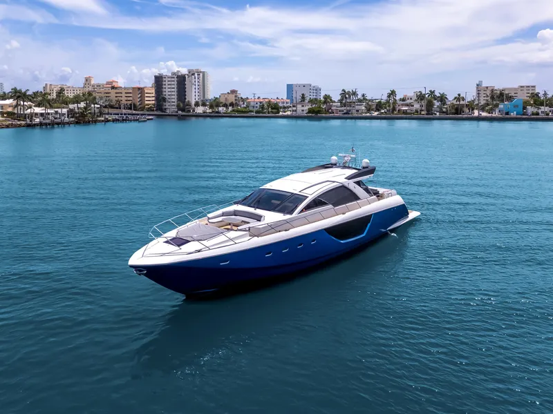 Slide: The Image of Luxury 2012 Cheoy Lee 76 Alpha yacht cruising in clear blue waters. - 4