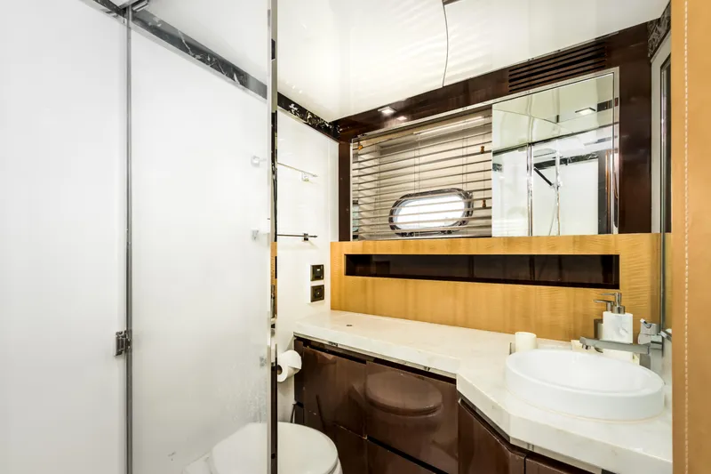 Slide: The Image of Luxurious bathroom in 2012 Cheoy Lee 76 Alpha yacht with modern fixtures and elegant design. - 42