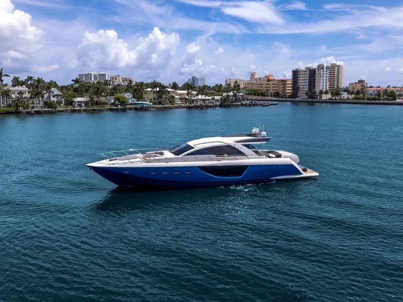 Slide: The Image of Luxury 2012 Cheoy Lee 76 Alpha yacht cruising on serene blue waters. - 5