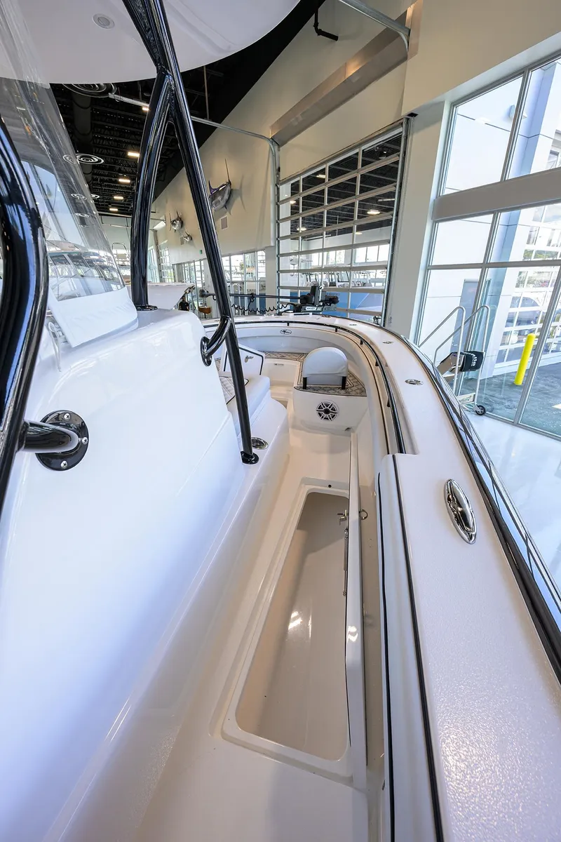 Slide: The Image of 2025 Valhalla Boatworks V-29 interior view, showcasing sleek design and spacious storage. - 12