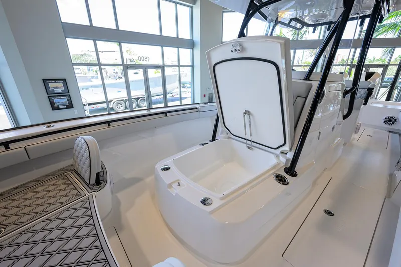 Slide: The Image of 2025 Valhalla Boatworks V-29 interior with open storage compartment and modern design. - 14