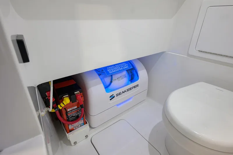 Slide: The Image of 2025 Valhalla V-29 boat interior with Seakeeper stabilizer and battery setup. - 15