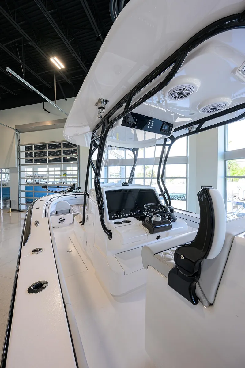 Slide: The Image of 2025 Valhalla Boatworks V-29 interior with modern console and seating. - 26