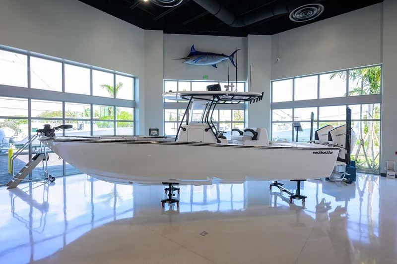Slide: The Image of 2025 Valhalla Boatworks V-29 displayed indoors, sleek design, modern showroom setting. - 3