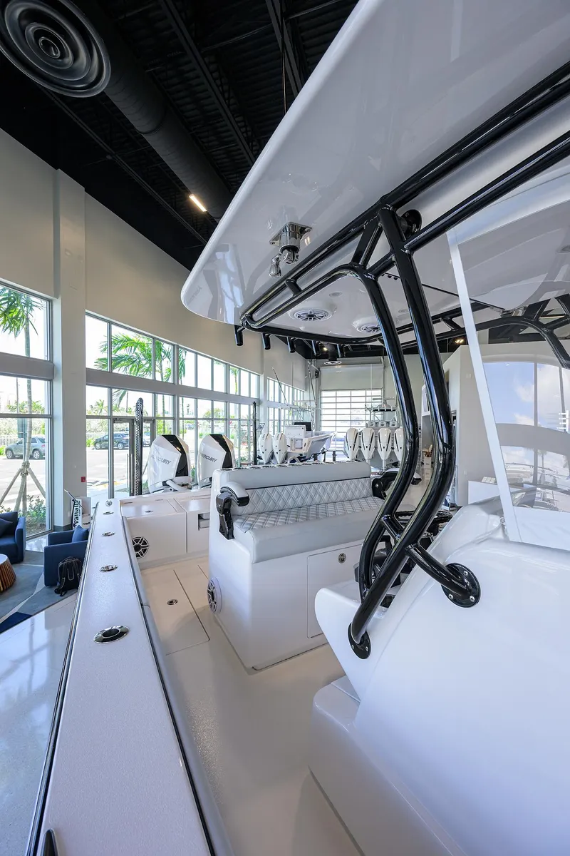 Slide: The Image of 2025 Valhalla Boatworks V-29 interior, showcasing sleek design and modern features in a showroom setting. - 30