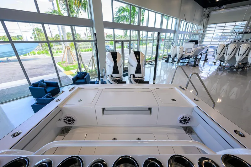 Slide: The Image of 2025 Valhalla Boatworks V-29 interior in showroom with modern design and sleek finishes. - 36