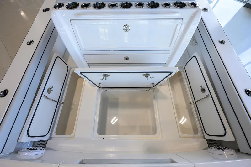 Slide: The Image of 2025 Valhalla Boatworks V-29 storage compartments and rod holders, showcasing sleek design and functionality. - 44