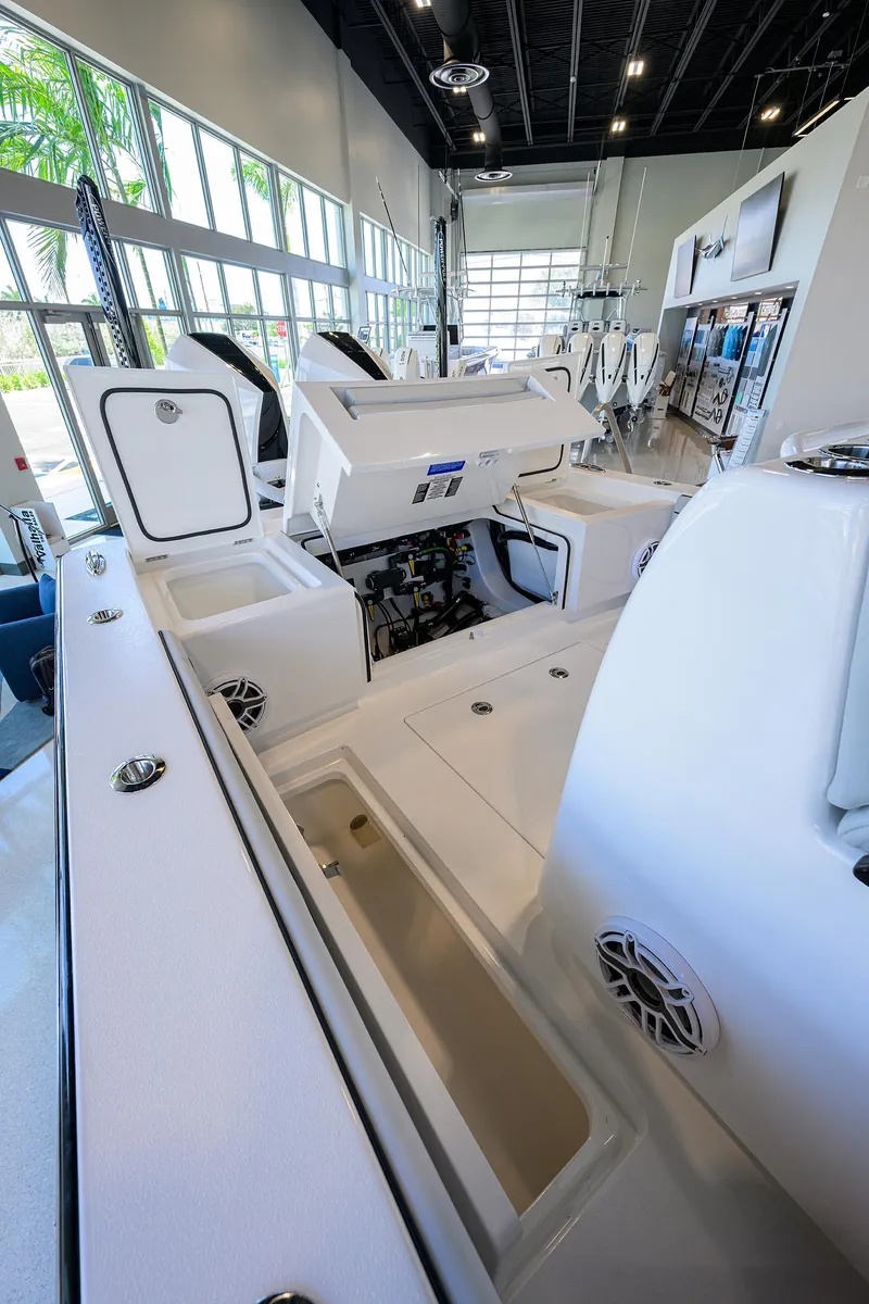 Slide: The Image of 2025 Valhalla Boatworks V-29 interior, showcasing sleek design and modern features in a showroom setting. - 48