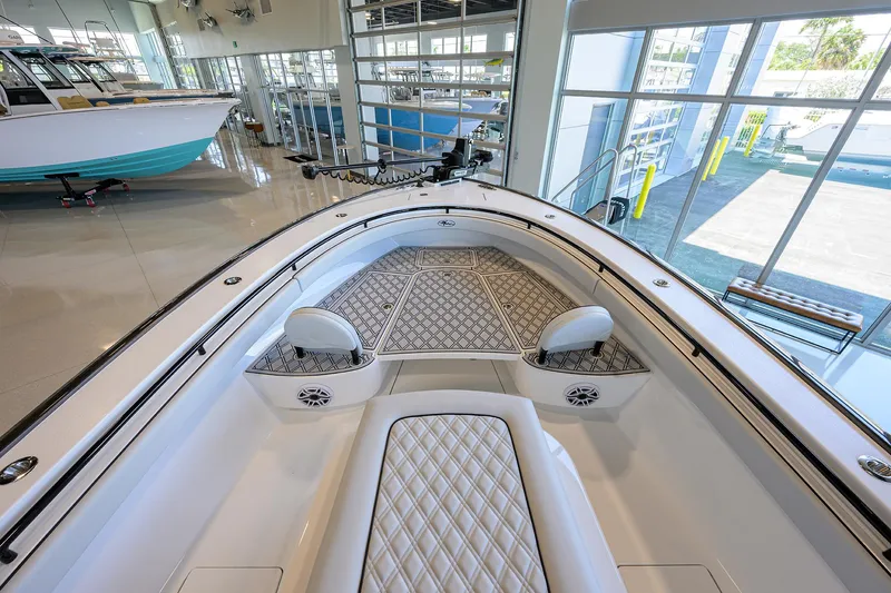 Slide: The Image of 2025 Valhalla Boatworks V-29 interior with luxurious seating and modern design in showroom. - 7