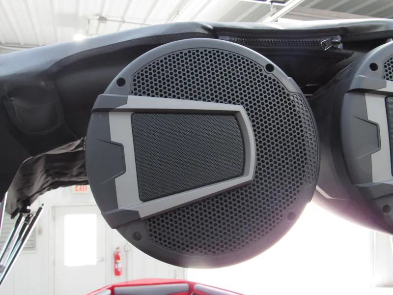 Slide: The Image of 2024 Axis T235 boat speaker system with modern design in a showroom setting. - 11