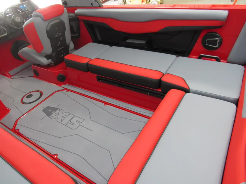 Slide: The Image of 2024 Axis T235 boat interior with red and gray seating and modern design. - 6