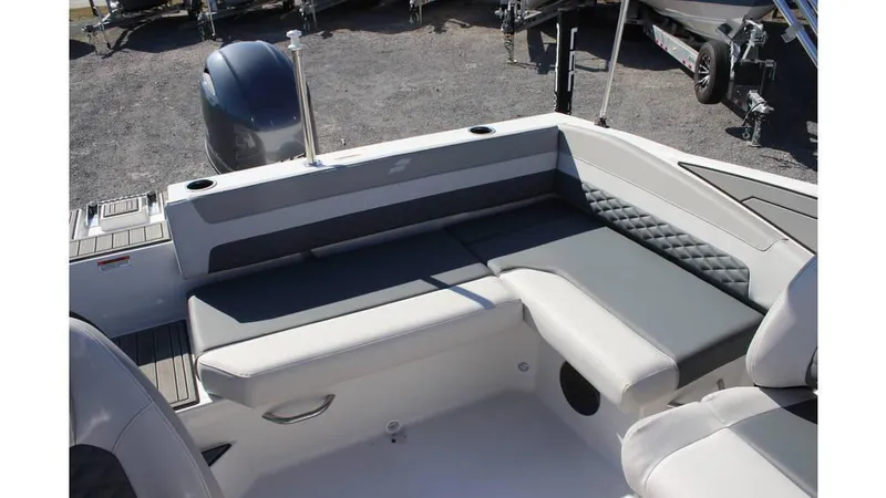 Slide: The Image of 2025 Starcraft SVX 190 OB DC boat interior with gray seating and modern design. - 12