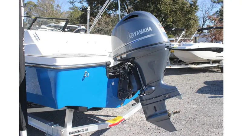 Slide: The Image of 2025 Starcraft SVX 190 OB DC boat with Yamaha outboard motor on trailer. - 7