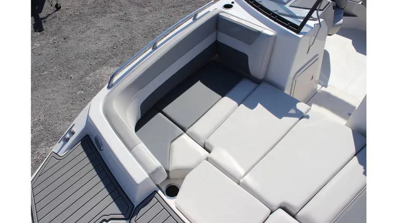 Slide: The Image of 2025 Starcraft SVX 190 OB DC boat interior with cushioned seating and sleek design. - 9