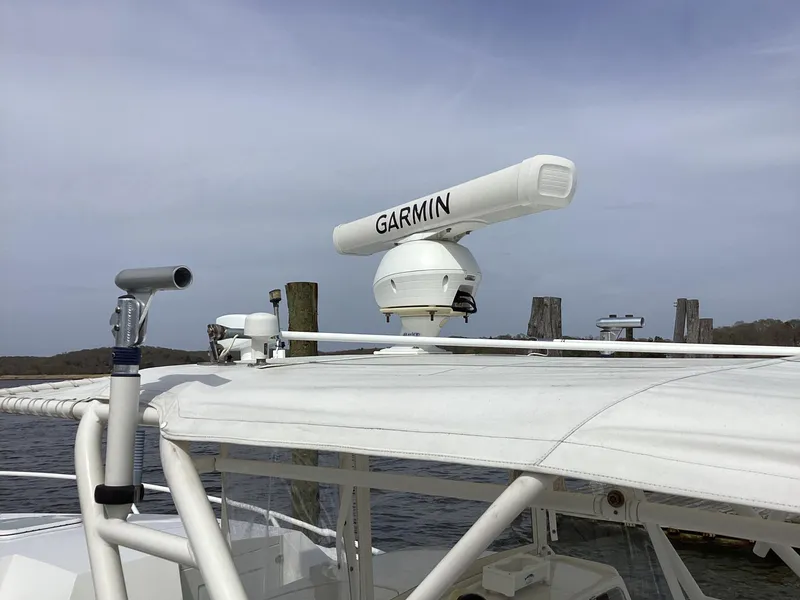 Slide: The Image of 2002 Jupiter 31 Cuddy boat with Garmin radar on top. - 5