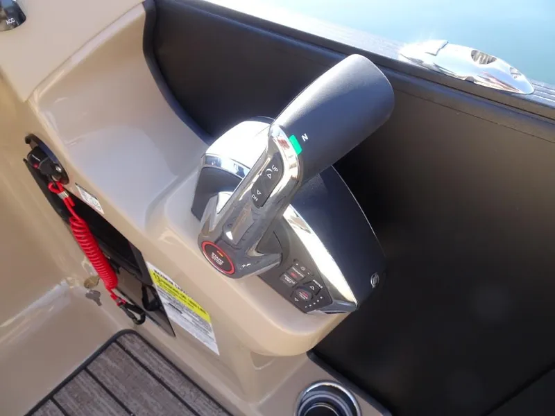 Slide: The Image of Throttle control of 2025 Harris Sunliner 250 boat, featuring sleek design and ergonomic handle. - 20