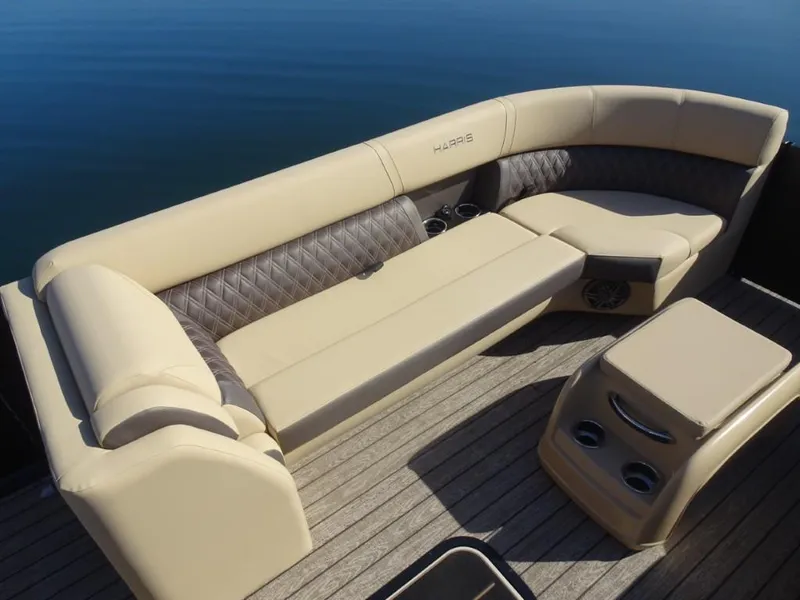 Slide: The Image of Luxurious seating on 2025 Harris Sunliner 250 pontoon boat with beige upholstery. - 24
