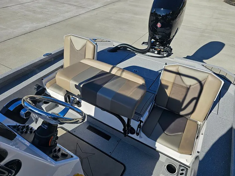 Slide: The Image of 2025 Vexus ACX2150 boat interior with steering wheel and seating arrangement. - 12