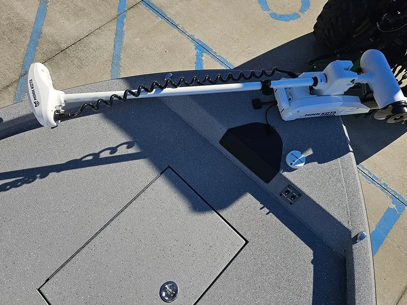 Slide: The Image of 2025 Vexus ACX2150 boat deck with trolling motor, viewed from above. - 22