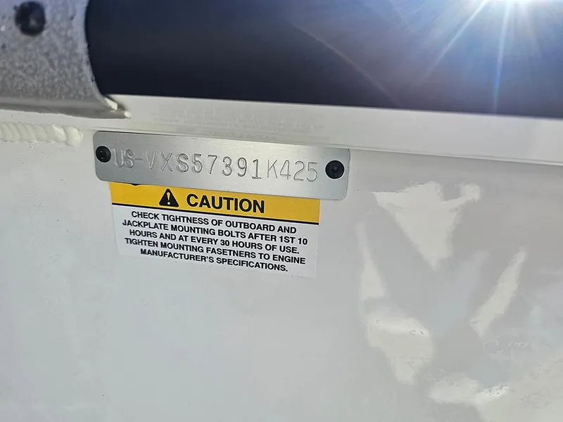 Slide: The Image of 2025 Vexus ACX2150 caution label with serial number and maintenance instructions. - 26