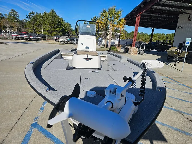 Slide: The Image of 2025 Vexus ACX2150 boat with trolling motor in outdoor showroom. - 4