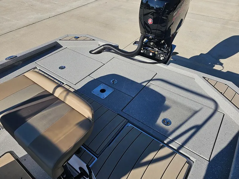 Slide: The Image of 2025 Vexus ACX2150 boat deck with seating and motor, showcasing modern design and functionality. - 9