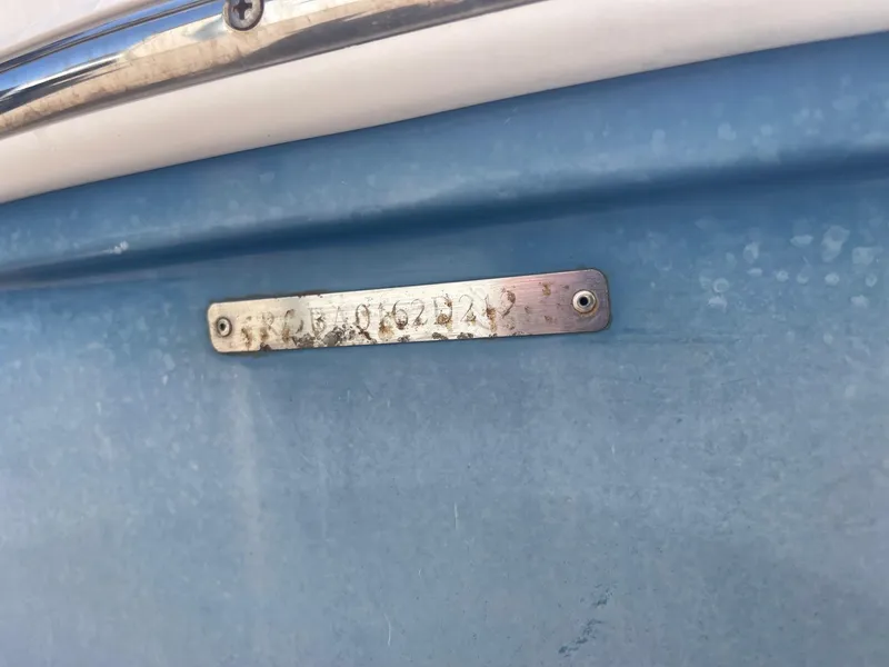 Slide: The Image of 2012 Robalo 180 CC boat hull with identification plate. - 18