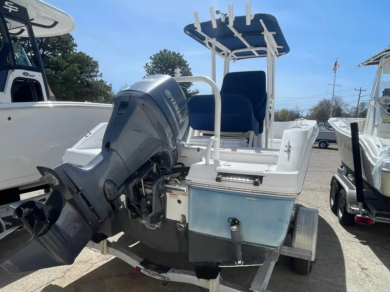 Slide: The Image of 2012 Robalo 180 CC boat with Yamaha outboard motor on trailer. - 3