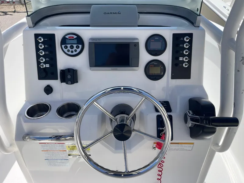 Slide: The Image of Control panel of 2012 Robalo 180 CC boat with Garmin navigation system. - 6