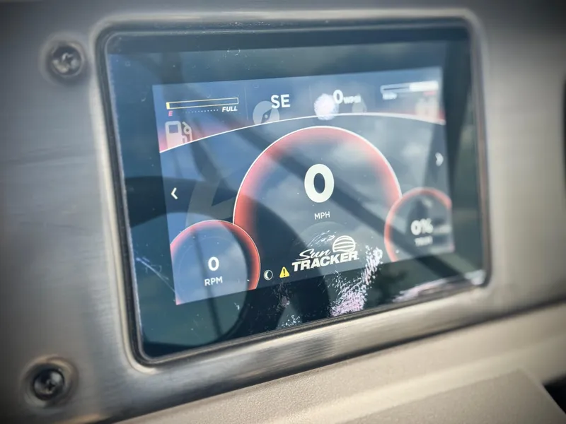 Slide: The Image of Dashboard display of 2024 Sun Tracker Party Barge 18 DLX showing speed and RPM. - 21
