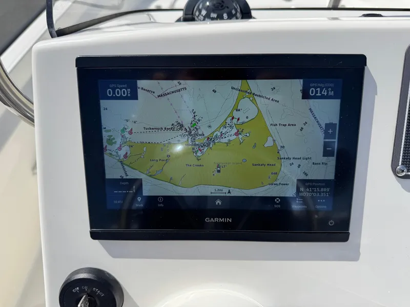 Slide: The Image of Garmin navigation display on 2022 Boston Whaler 170 Montauk boat dashboard. - 11