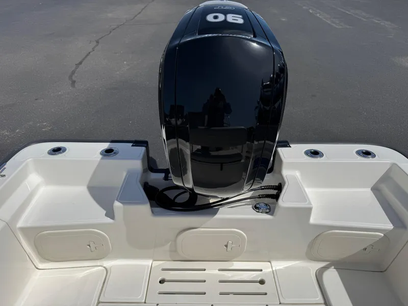 Slide: The Image of 2022 Boston Whaler 170 Montauk boat with a 90 HP engine, rear view. - 15