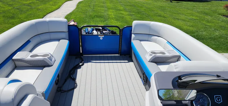 Slide: The Image of 2023 Godfrey SWEETWATER 2286 SB pontoon boat interior with plush seating and open deck. - 6