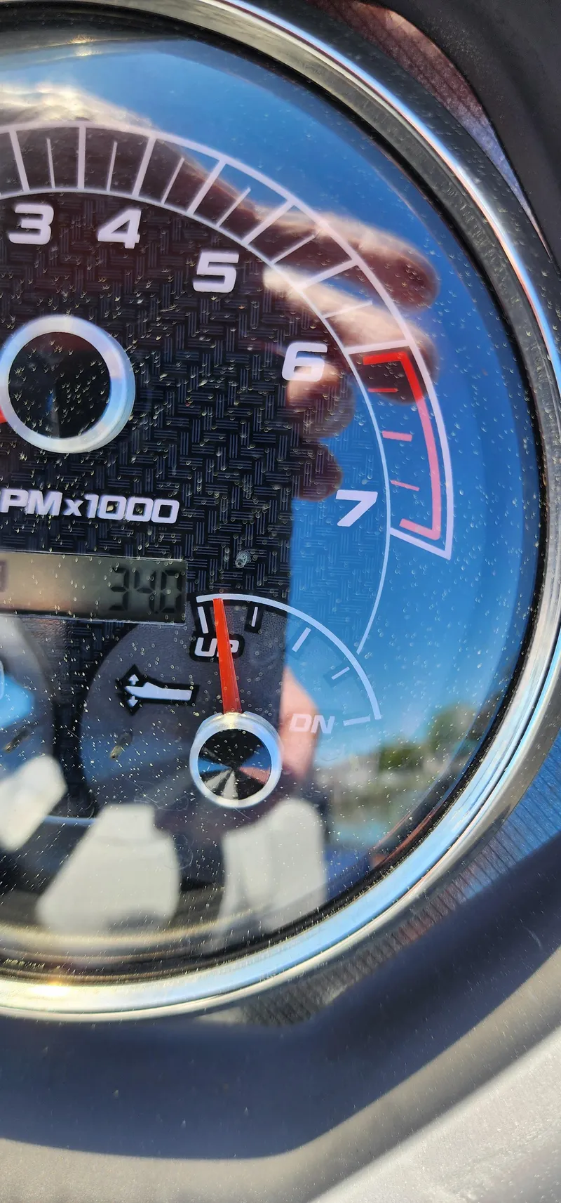Slide: The Image of Close-up of 2023 Godfrey SWEETWATER 2286 SB tachometer showing RPM and fuel gauge. - 8