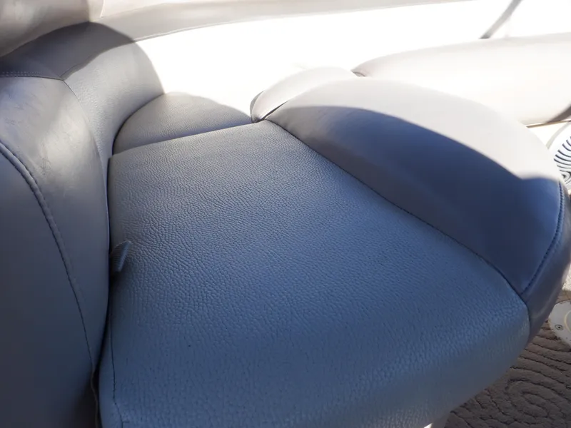 Slide: The Image of Close-up of blue seating on 2014 Sun Tracker Party Barge 24 DLX boat. - 15