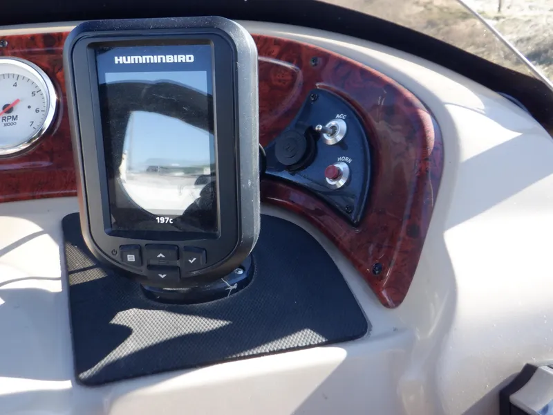 Slide: The Image of Control panel of 2014 Sun Tracker Party Barge 24 DLX with Humminbird fish finder. - 23