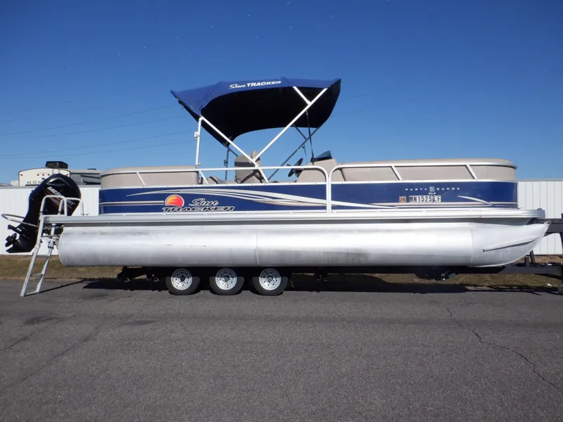 Slide: The Image of 2014 Sun Tracker Party Barge 24 DLX pontoon boat on trailer, side view. - 5