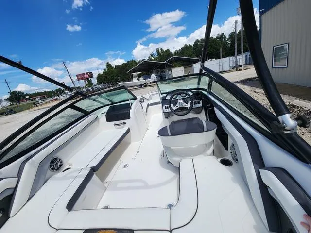 Slide: The Image of 2015 Yamaha Boats AR192 interior with sleek design and modern dashboard. - 11