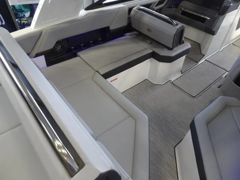 Slide: The Image of 2025 Cobalt R4 boat interior with sleek seating and modern design. - 12