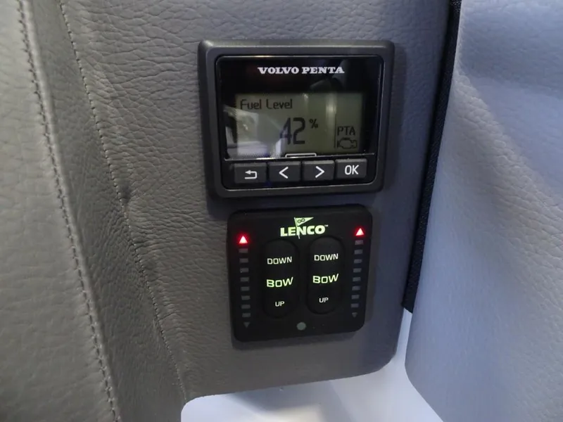 Slide: The Image of Control panel in a 2025 Cobalt R4 boat, featuring Volvo Penta and Lenco systems. - 18