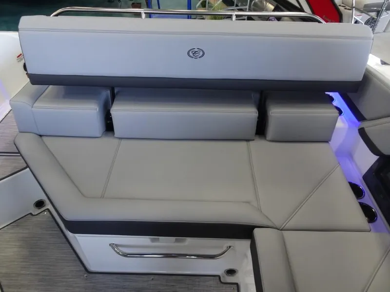 Slide: The Image of 2025 Cobalt R4 boat interior with sleek gray seating and modern design. - 21