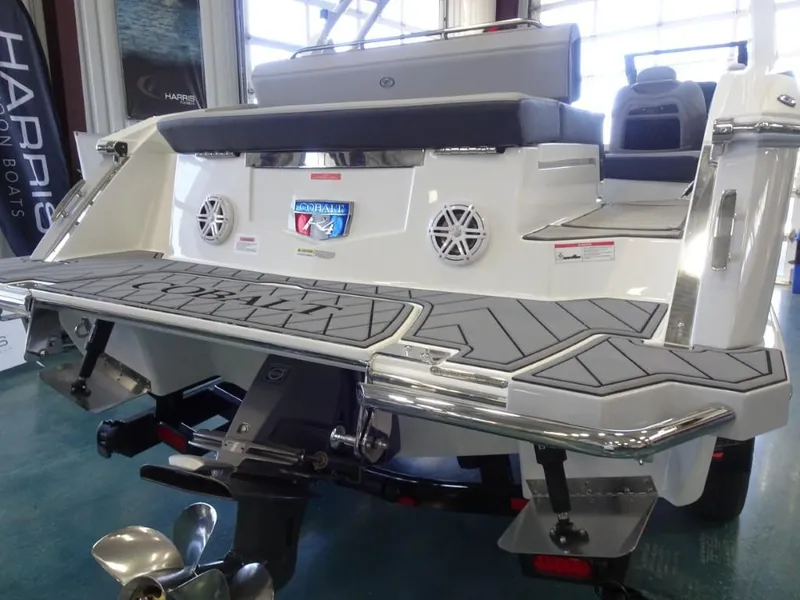 Slide: The Image of 2025 Cobalt R4 boat rear view with swim platform and propeller. - 4