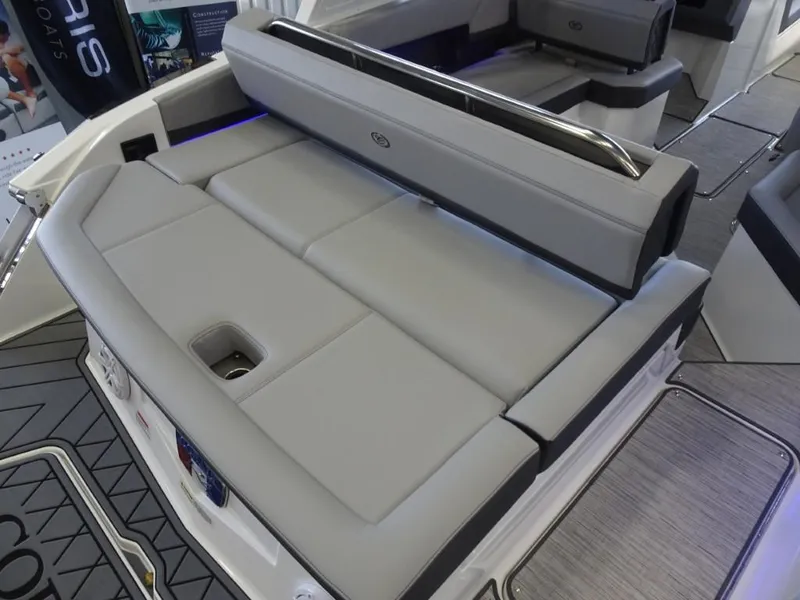 Slide: The Image of 2025 Cobalt R4 boat interior with gray seating and modern design. - 7