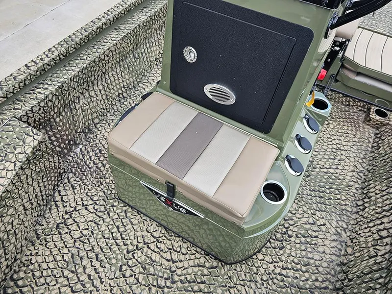 Slide: The Image of Vexus ACX 2000 boat interior, 2025 model, featuring camo design and seating with cup holders. - 18