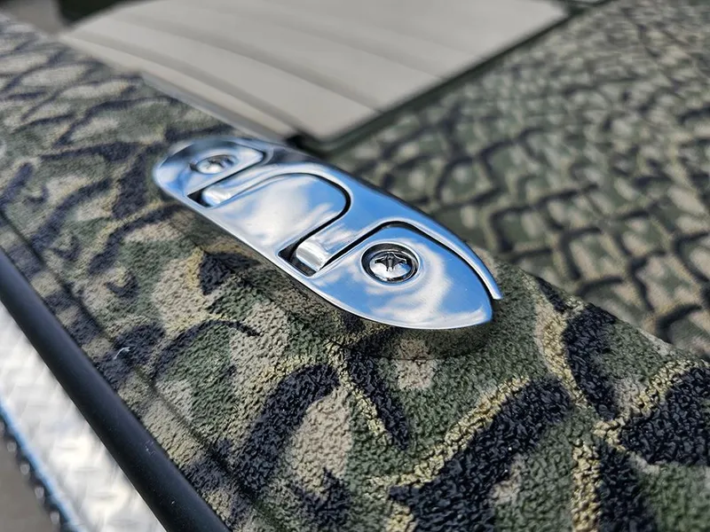 Slide: The Image of Camouflage-patterned Vexus ACX 2000 boat detail with chrome hardware, 2025 model. - 21