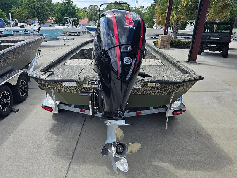 Slide: The Image of 2025 Vexus ACX 2000 boat on trailer, featuring camouflage design and Minn Kota trolling motor. - 5